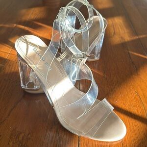 Gorgeous clear strapped pumps..like new.